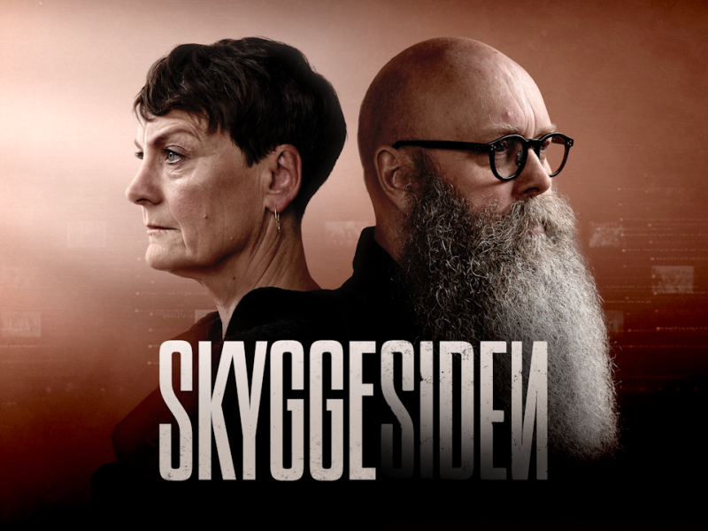 Janni Pedersen og Carsten Norton står med ryggen til hinanden bagved titlen Skyggesiden.