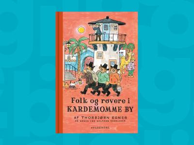 Bogforsiden til Folk og røvere i Kardemomme by på en blå baggrund.