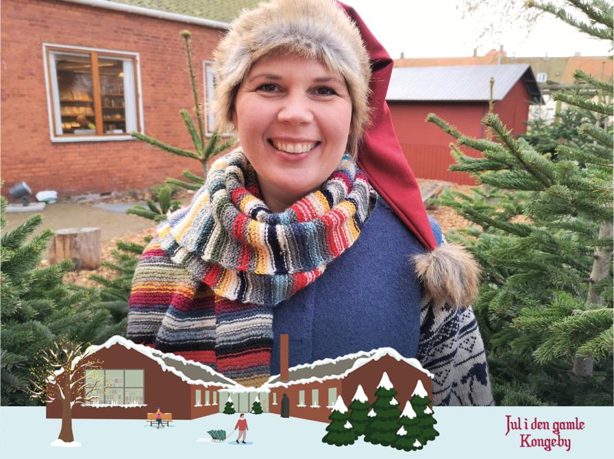Biblioteksnissen Frigge. I bunden en illustration af Nyborg Bibliotek med sne og logoet for Jul i den gamle Kongeby.